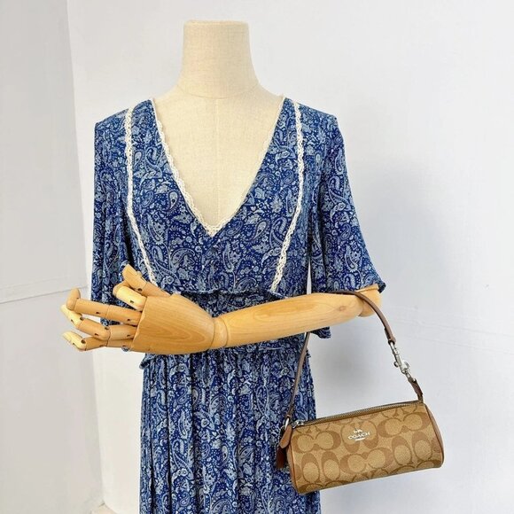 Coach CP475 Nolita Barrel Bag In Signature Canvas IN KHAKI SADDLE - Picture 1 of 8